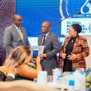 Vice President Kembo Mohadi (far left) and Women Affairs, Community, Small and Medium Enterprises Development Minister Senator Monica Mutsvangwa (far right) present the Global Business Achievers Network Platinum Award to Hon Dr Martin Muduva (centre) during the GBAN Awards Ceremony held in Harare recently.